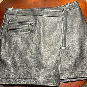 New without tags lamb leather black mini skirt.